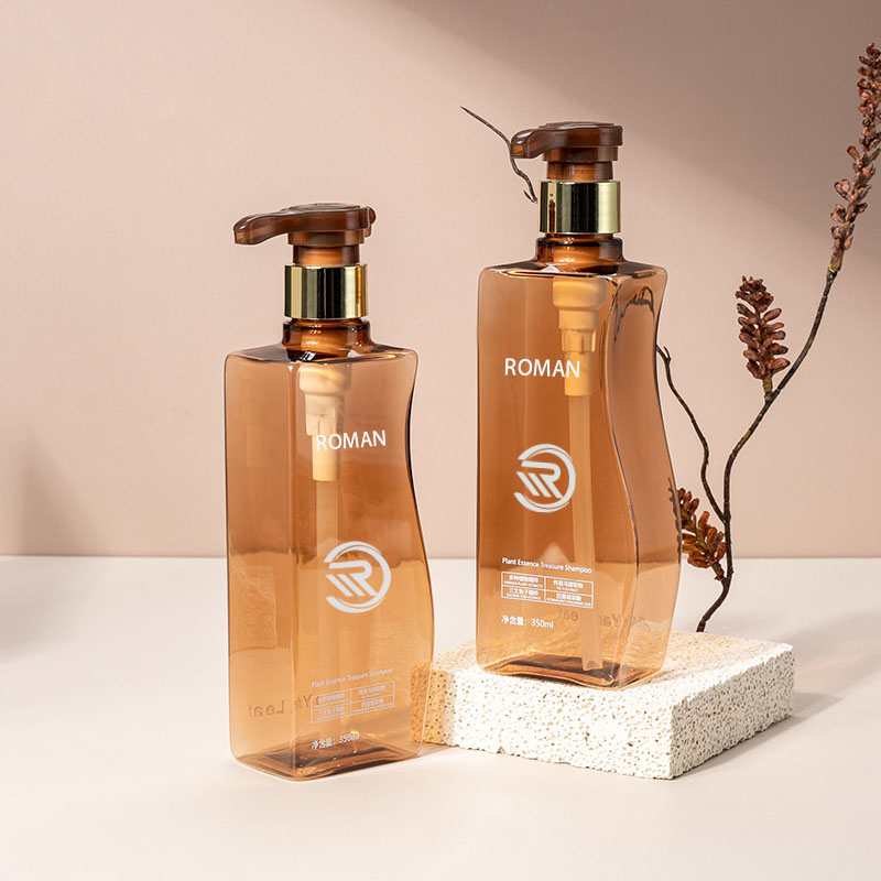 Certae 350ml 500ml curvo-amber Pet Plastic Inanis Suspendisse potenti Utrem cum Pump pro Hair Tutela Shampoo Conditioner vel Face Cream Usus