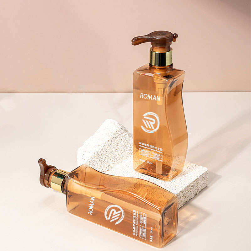 Certae 350ml 500ml curvo-amber Pet Plastic Inanis Suspendisse potenti Utrem cum Pump pro Hair Tutela Shampoo Conditioner vel Face Cream Usus Certae 350ml 500ml curvo-amber Pet Plastic Inanis Suspendisse potenti Utrem cum Pump pro Hair Tutela Shampoo Conditioner vel Face Cream Usus